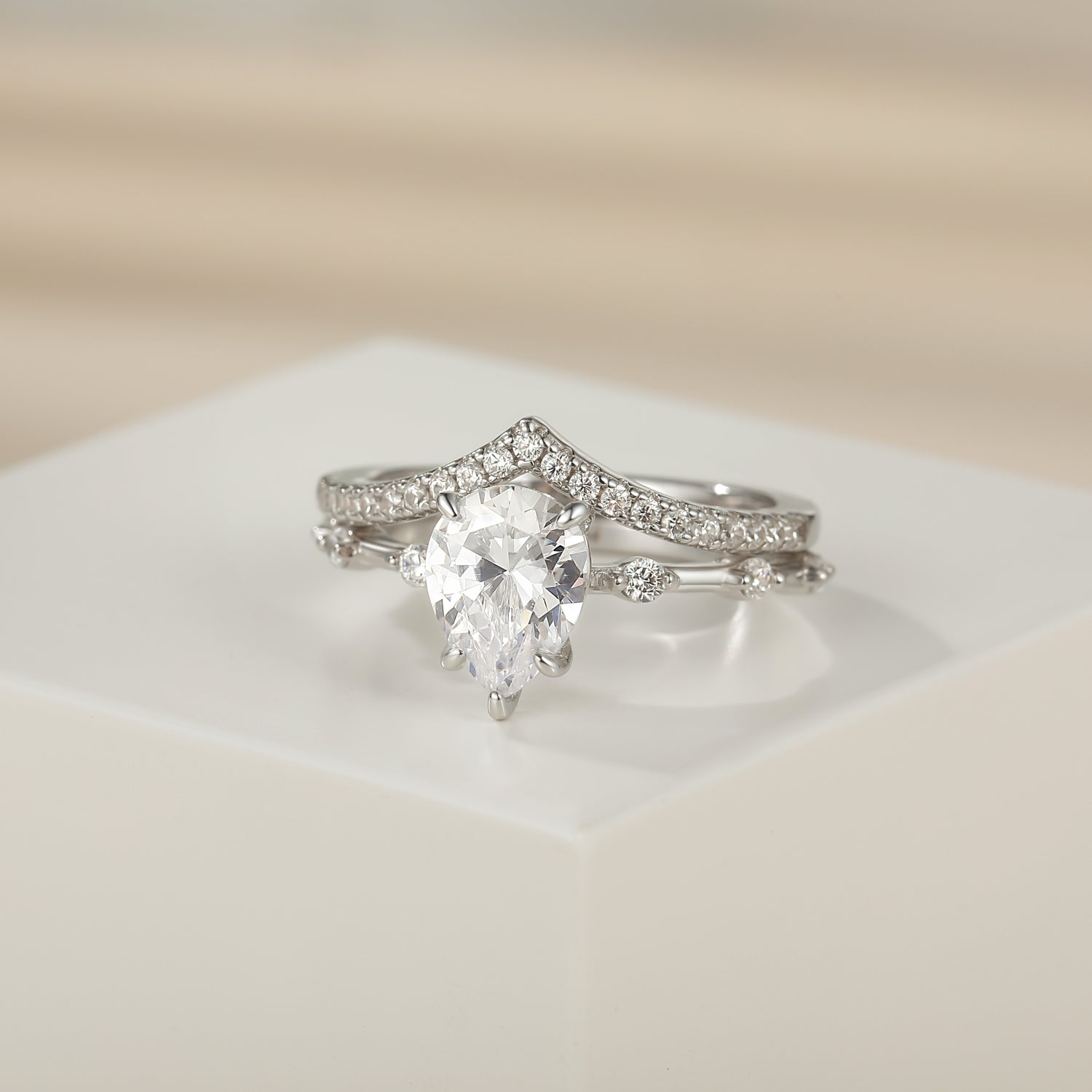 cheap wedding ring sets, pear cut ring, cubic zirconia ring, affordable wedding ring sets, cheap engagement rings, sterling silver rings for women, fake bridal set rings