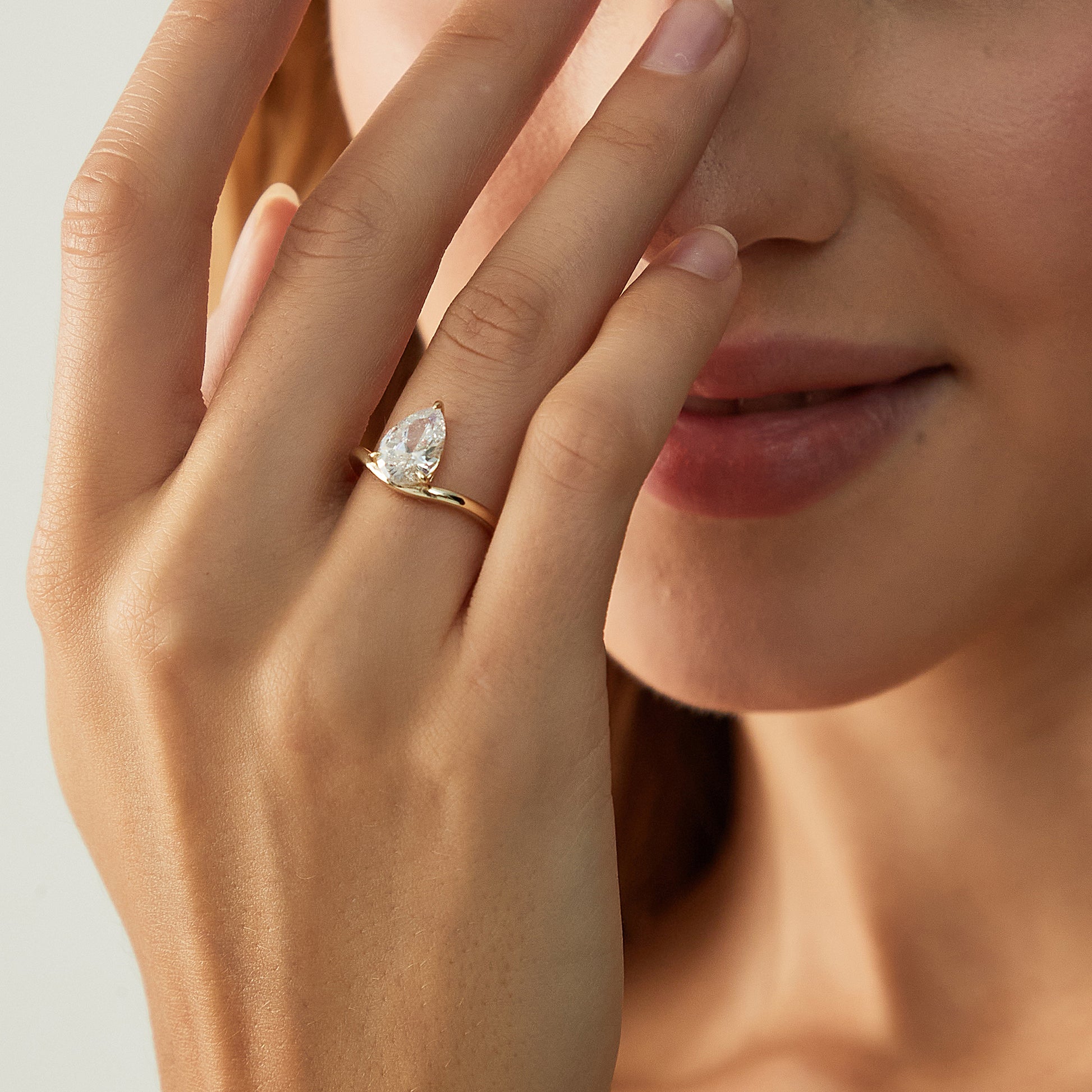 curved engagement rings, curved band, pear engagement rings, pear cut, cubic zirconia rings, cubic zirconia usa, travel rings, fake diamond rings, cz rings, affordable jewelry, gold engagement rings