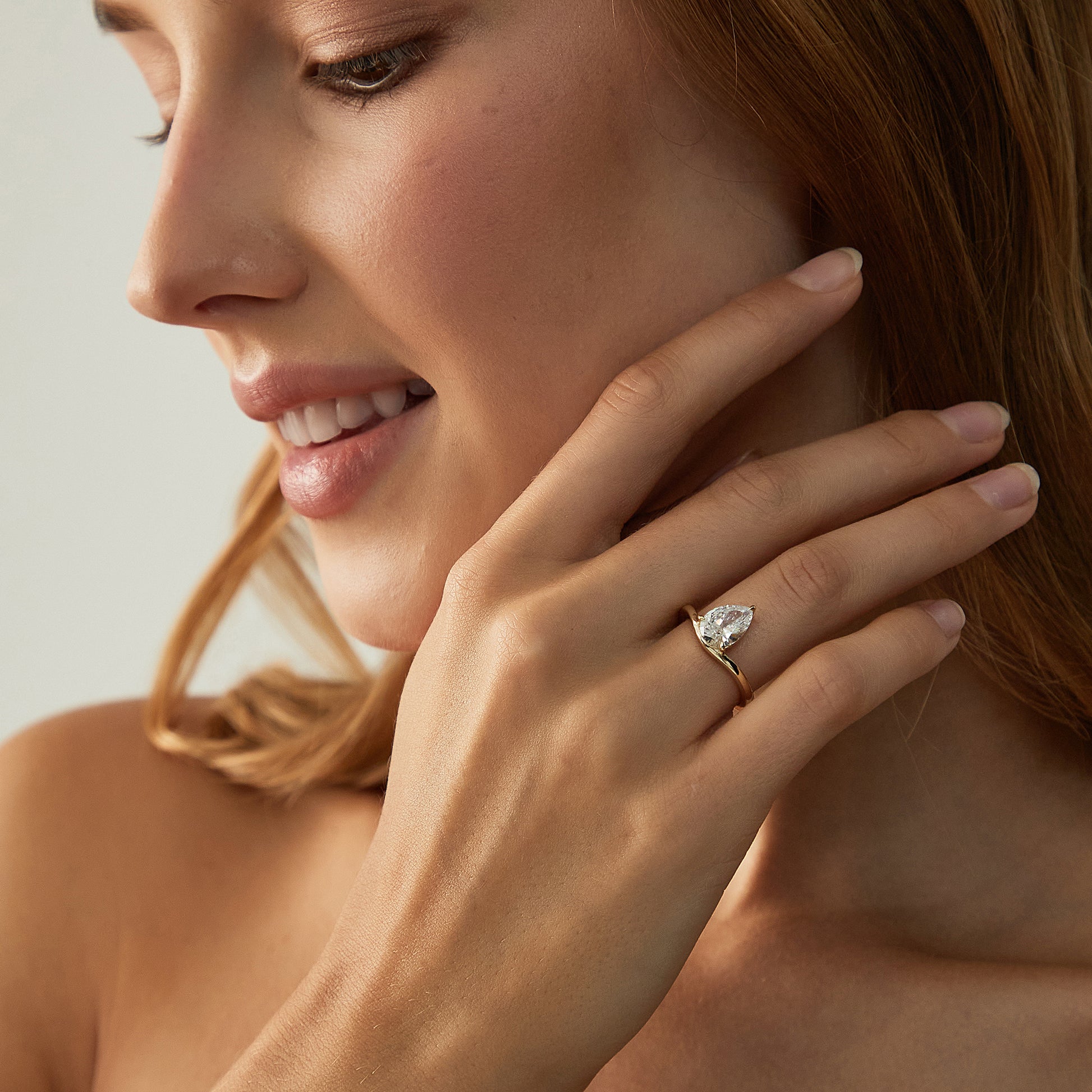 curved engagement rings, curved band, pear engagement rings, pear cut, cubic zirconia rings, cubic zirconia usa, travel rings, fake diamond rings, cz rings, affordable jewelry, gold engagement rings