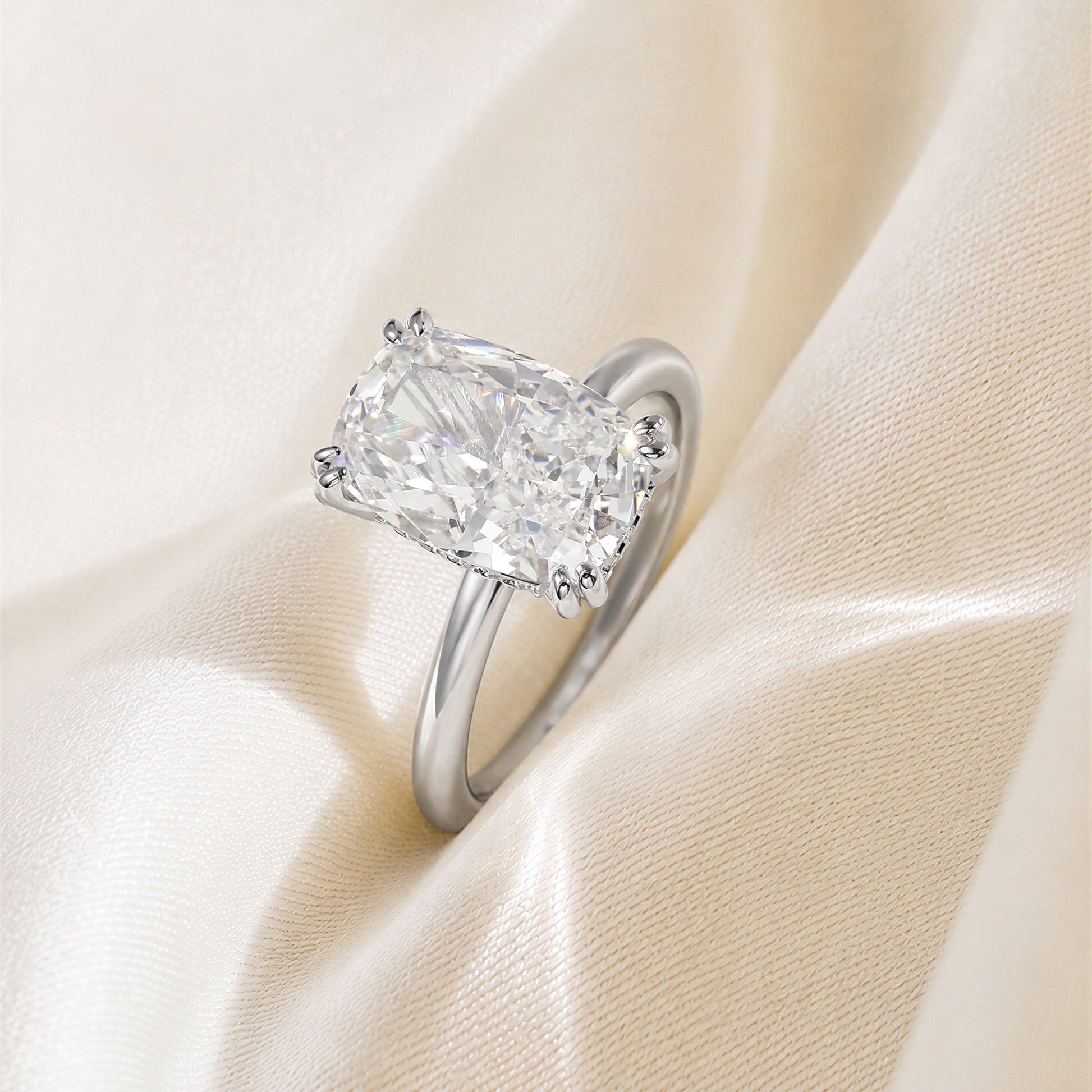 travel ring, hidden halo elongated cushion cut engagement ring, solitaire elongated cushion cut engagement ring, solitaire engagement ring, cubic zirconia, hidden halo, elongated cushion cut, cz wedding rings, eamti