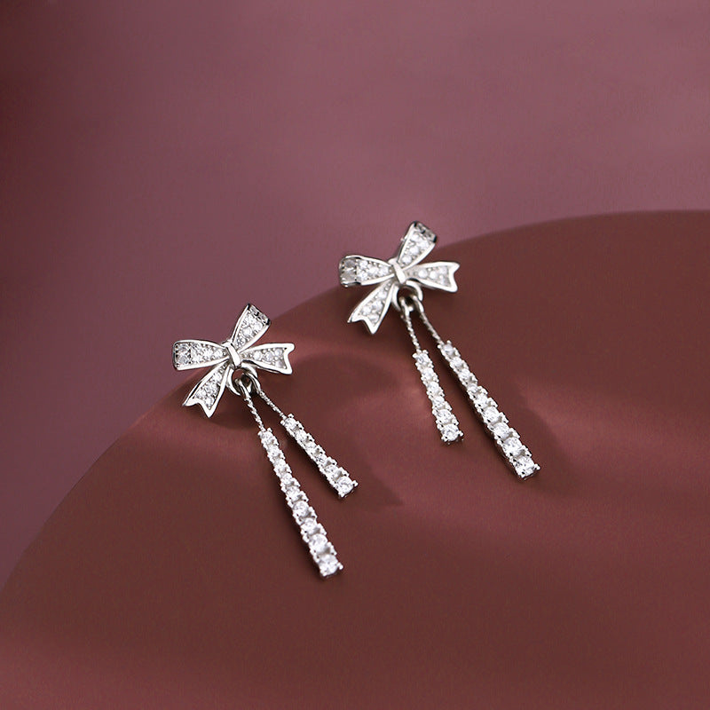 Orecchini pendenti in argento sterling con design a fiocco