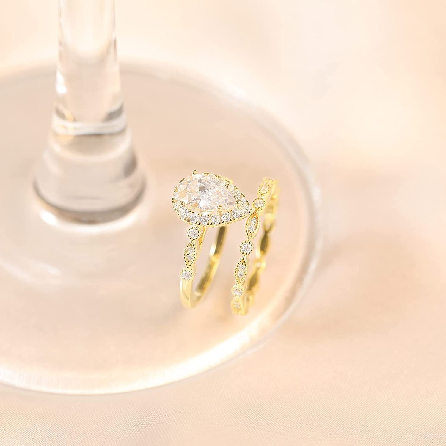 fake bridal set rings, gold wedding band sets, couples wedding ring sets, wedding ring set his and hers, pear shaped engagement ring, pear engagement rings