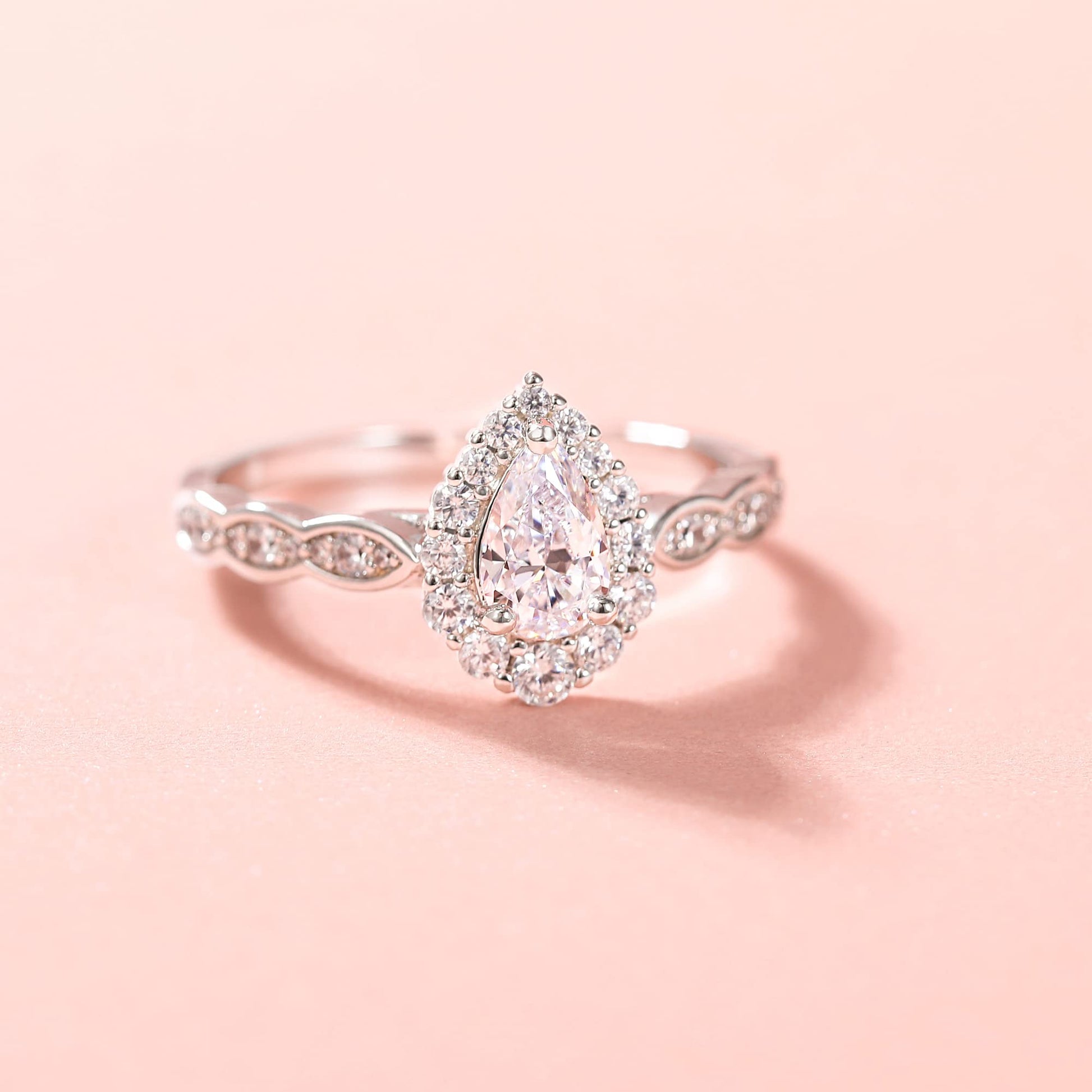 travel wedding ring sets, cheap wedding ring sets, fake bridal set rings, sterling silver wedding rings, pear shaped engagement ring